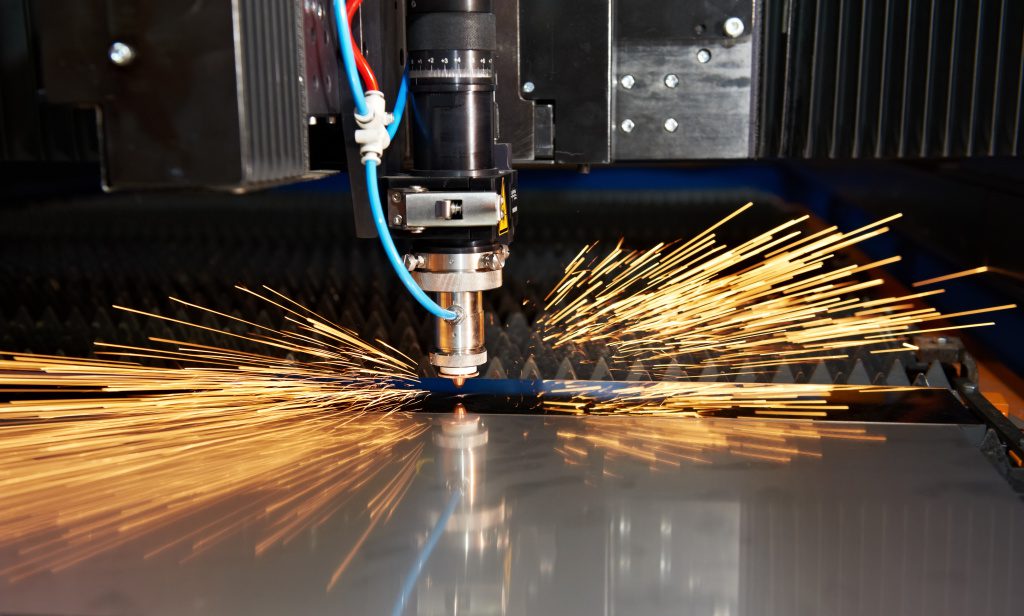 Laser cutting of metal sheet with sparks